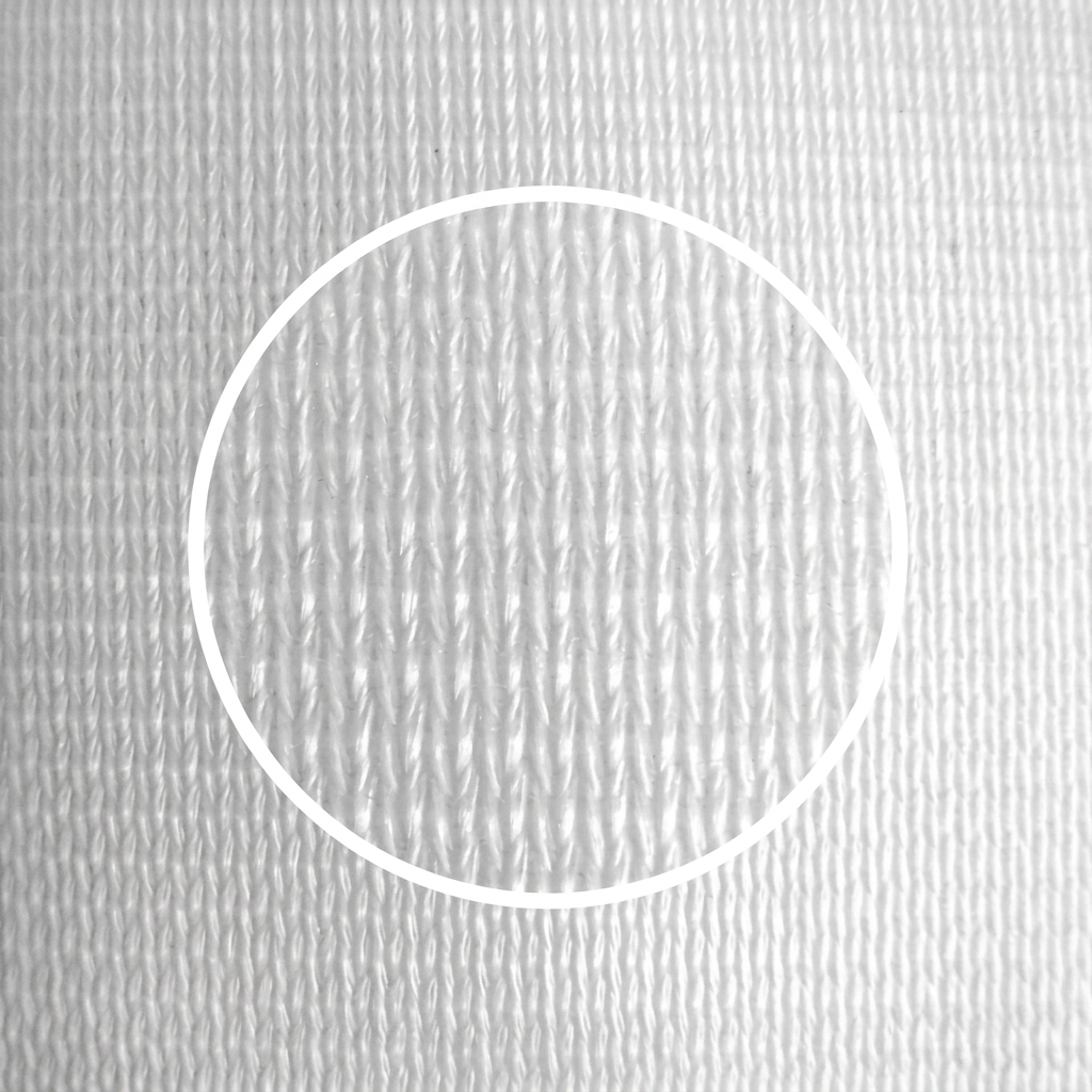 Warp-knit polyester fabric swatch close-up